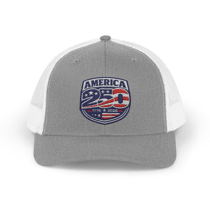 Gray and white trucker hat with 'America 250' patch on a white background